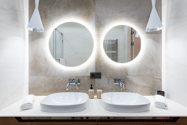 Vanity mirrors with lights in a modern bathroom